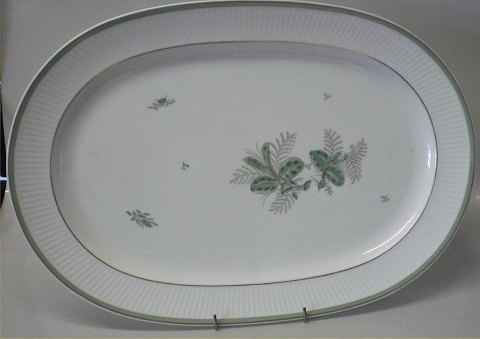 1513-14079 Large Platter 44.5 x 30.4 cm Green Melody #1513 Royal Copenhagen 
White glazed ribbed porcelain with green decoration and gold
