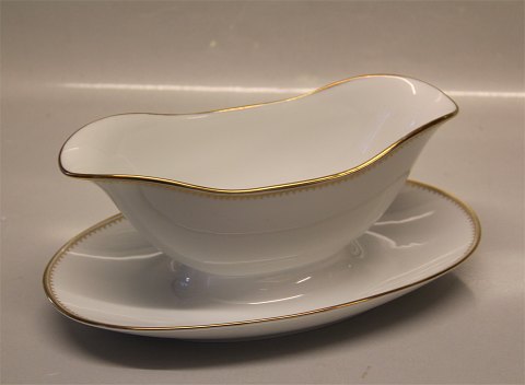 B&G Menuet: Hvidt porcelæn, takket guldkant, hvid, form 601 Bing & Grøndahl 008 
Sovseskål på fod 20 cm (311)