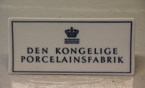 Kongelig Dansk Forhandlerskilt til bord eller hylde 6.5 x 14 cm Den Kongelige 
Porcelainsfabrik