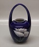 Kongelig Dansk 
559-29 RC Vase with handle with flower on deep blue 20 cm Painter 55 pre 1923 
2nd due to roughness under the handle