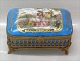 Sevres Porcelain box ca 7 x 16 x 11 cm including bronze mounting
SIGNED WATTEAU