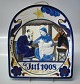 1908 Den kongelige porcelænsfabriks Store Juleplatter af Fajance fra Aluminia 
630-556 Julerelief 1908 Josef og Jomfru Maria med Jesusbarnet R. Harboe 
Bueformet 26,5 x 23,5 cm 
