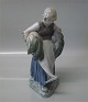 Royal Copenhagen figurine 
903 RC Girl with hay & rake Chr. T. 1905 21 cm