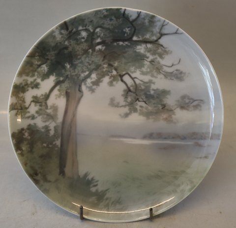 B&G Porcelain B&G 8786-357-20 Plate: A Tree by the sea 20 cm Signed MS Marie 
Smidt Small cut down on the rim
